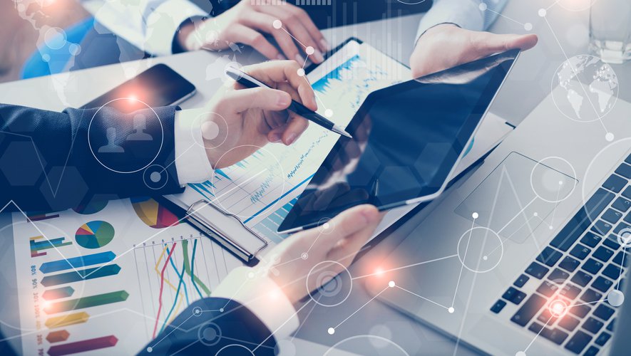 Businessman and businesswoman uses digital tablet in office 130615